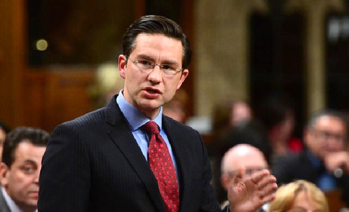 Conservative MP Pierre Poilievre stands during question period in the House of Commons on Oct. 18, 2017.